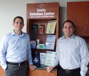 Ryan Torresan and Don Klacking (CFO) visiting an office by the Smile Solution Center.
